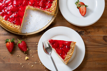Strawberry pie, sliced on a white plate