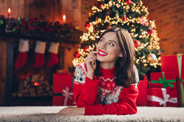 Photo portrait of youngster dreaming girl bite finger looking empty space wear ugly red sweater...