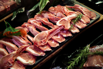 raw meat on the bench in the store