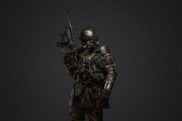 Fototapeta premium Portrait of isolated on grey stalker surviving in post apocalypse.