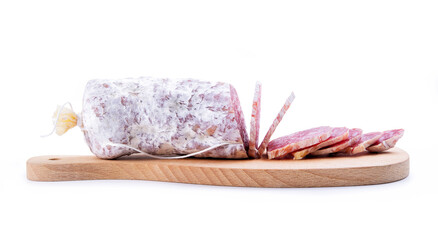 Sliced salami on cutting board isolated on white background, close-up.