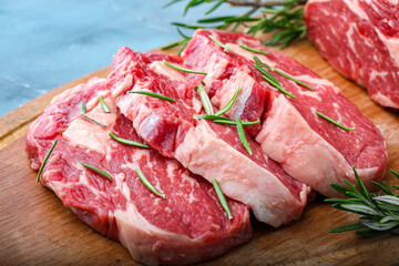 raw meat on a wooden board