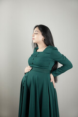 Fototapeta premium pregnant woman hand on the belly