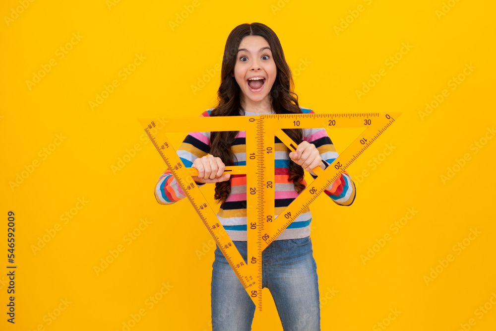 Poster amazed teenager. measuring school equipment. schoolgirl holding measure for geometry lesson, isolate