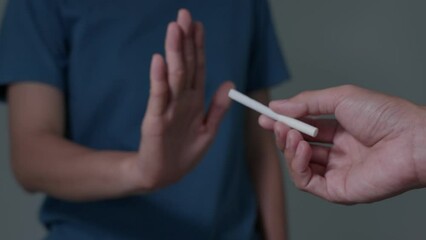 Woman stop smoke, refuse and break take cigarette. wold tobacco day and quit smoke. Lung Cancer, Respiratory, emphysema ,cardiovascular disease, Pulmonary disease, pneumonia, narcotic, nicotine effect