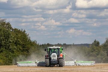 a tractor preparing the field