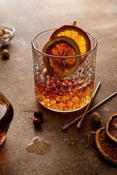 Glass of cognac with orange