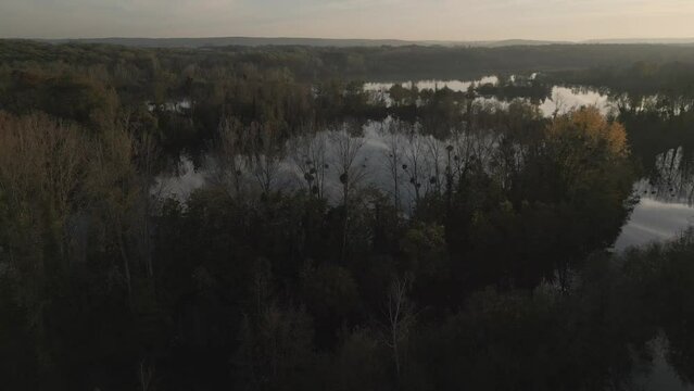 Drone footage of marshes in Essonne, a vast wetland area during the down in France