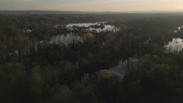 Drone footage of marshes in Essonne, a vast wetland area during the down in France