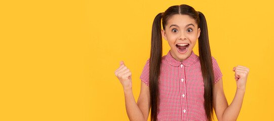 I can and I win. Happy girl scream making winning gesture. Excited child got win. Child face, horizontal poster, teenager girl isolated portrait, banner with copy space.