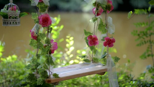 Birdcage with flowers flower swing decorative wedding entourage