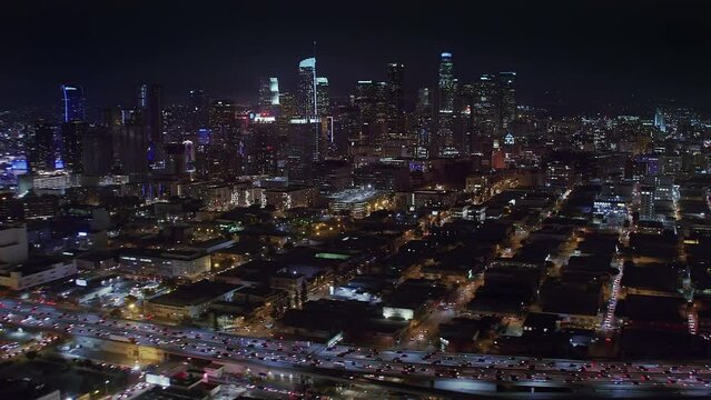 
Amazing Aerial View Of Downtown Los Angeles. City Skyline With its Famous Skyscrapers. Traffic Over Major Highways. California, United States. Shot in 8K. Blurred logos and Brands.