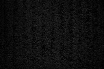 Black concrete wall. Grunge background