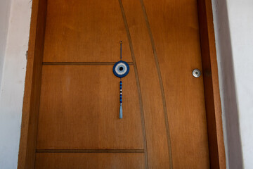 Wooden door with Amulet