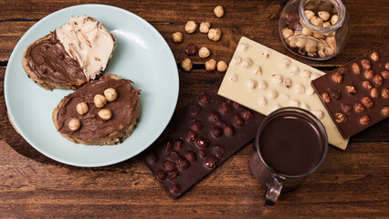 Slice of bread full of chocolate and hazelnut spread. Homemade delicious hazelnut and chocolate spread on bread. Wooden cutting board with a slice of bread full of chocolate and hazelnut spread on top