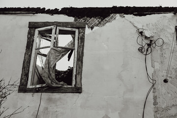 Open window of an abandoned house