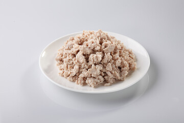 Boiled Minced Pork in white plate on white background.
