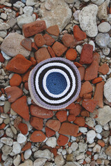Baskets on the background of stones and the sea