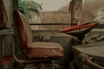 Abandoned trolleybus, seats, steering wheel