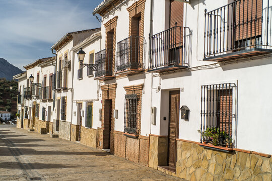 The historic center of the old town of Antequera. Historic brick church. small white buildings and narrow streets. horizontal, daylight