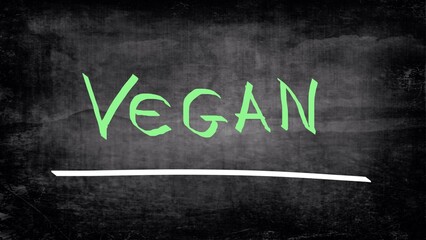 Obraz premium Vegan concept handwritten on blackboard