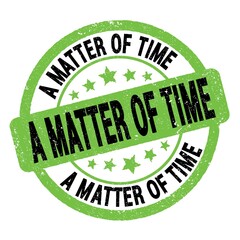 A MATTER OF TIME text written on green-black round stamp sign.