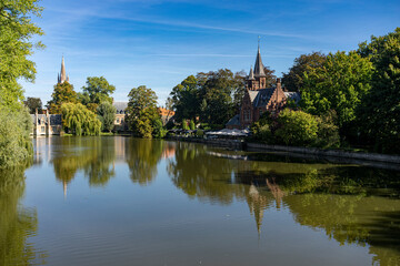 Bruges, Belgium: view of Minnewater lake in historic city center