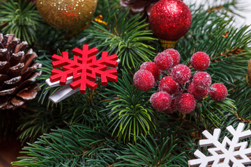 beautiful branches of the Christmas tree with cones and toys