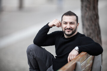 Obraz premium Natural looking guy posing outdoors, wearing casual clothes