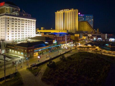 Hard Rock Hotel, Showboat and Ocean Casino Resort at Boardwalk at night in Atlantic City, New Jersey NJ, USA. 