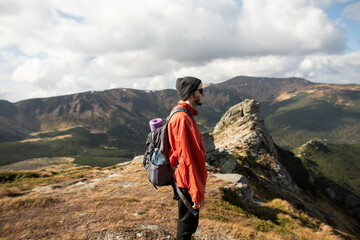 young man hiking in the mountains