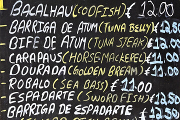 Menu of traditional Portuguese cuisine in front of restaurant, Lagos, Algarve, Faro district,...