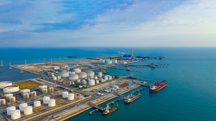 Aerial view of twilight petrochemical oil refinery plants at industrial estate Thailand. Oil and...