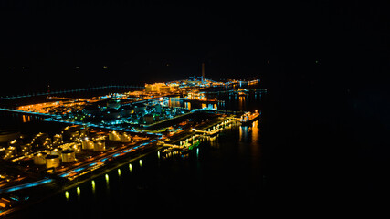 Aerial view of twilight petrochemical oil refinery plants at industrial estate Thailand. Oil and...