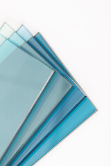 Sheets of Factory manufacturing tempered clear float glass panels cut to size - 546651669