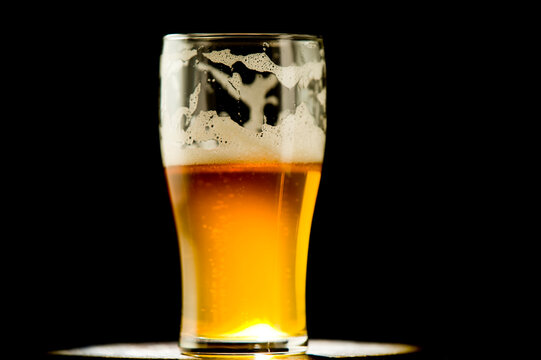 Beer beauty shot of lacing foam - Powered by Adobe