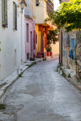 Fototapeta na wymiar Anafiotika, scenic tiny neighborhood of Athens, part of the old historical district Plaka, narrow streets, Athens, Greece