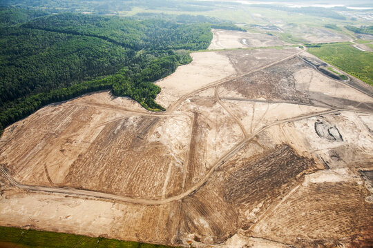 Soil being prepared for reaching tar sands beds, Fort McMurray, Alberta, Canada