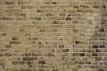 Background of yellow brick texture. Brick wall pattern