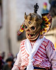 Buddhist in traditional demon ghost clothing in Ritual Dance at the Tiji Festival in Nepal.