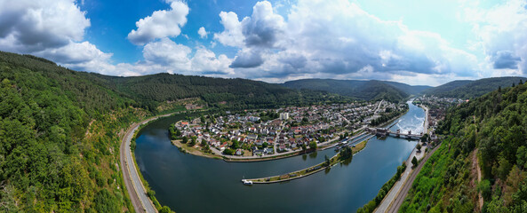 Drone view of a loop in the river Neckar near Heidelberg with cloudy summer sky