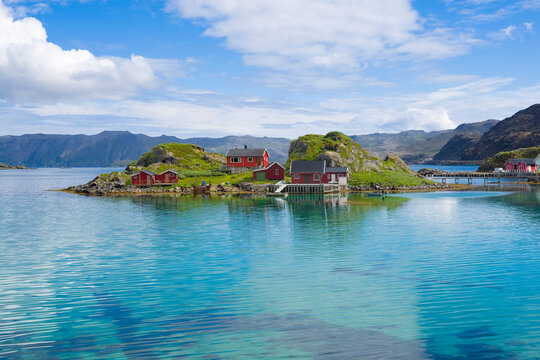 Fishing village with traditional red rorbu at Trollholmen island, Mageroya, Norway