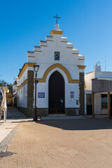 Obraz premium Charming fisherman's chapel located on the beach and surrounded by some of the best eateries in Sanlucar de Barrameda, Andalusia, Spain