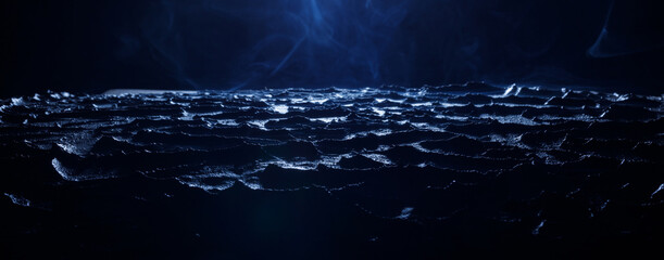 Earth in cracks on dark background. Panoramic view of the abstract fog.  Beautiful swirling blue...