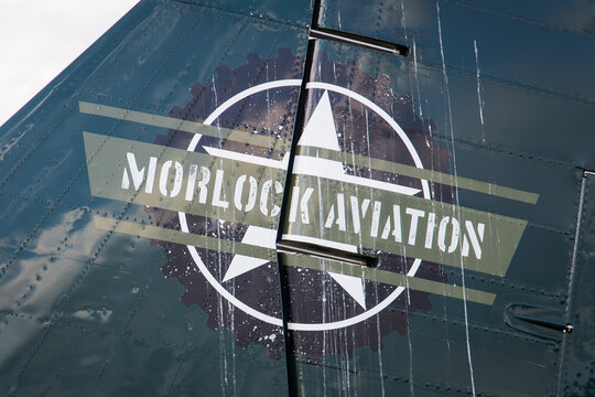 Douglas DC-3 airplane tail with Morlock Aviation company logo