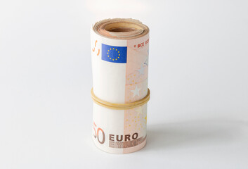 rolled up money, 50 euro banknote isolated on white background
