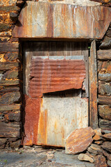 Old door of an abandoned old house in the north of Portugal