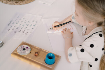 Kid practicing writing 