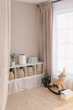 Stylish beige well organised and tidy children's room