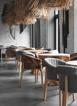 Contemporary cafe interior with gray wall